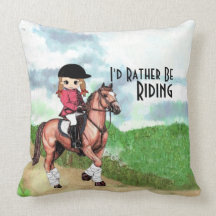 Almohada de la equitación del chica