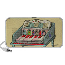 Altavoz retro del piano del clavicordio del pájaro