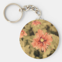 Amapolas de opio de color salmón en verde llaveros personalizados