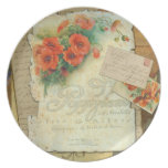 Amapolas y placa antigua de la partitura plato