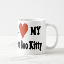 Amo mi mercancía del gatito de la metida de pata taza