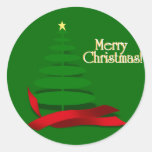 Árbol de navidad con la cinta roja pegatina