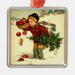 Árbol de navidad que lleva Orna del muchacho del V Ornamentos De Navidad