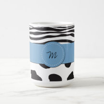 Azul blanco de la vaca del negro con monograma de  taza