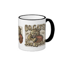 Baloncesto salvaje de los gatos por los estudios d taza