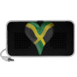 Bandera jamaicana en un corazón laptop altavoces