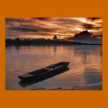 Barco solo en la puesta del sol en el río Danubio posters