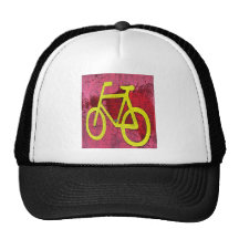 Bicicleta amarilla gorros bordados