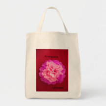 Bolsa com adesivo de flor artesanal.