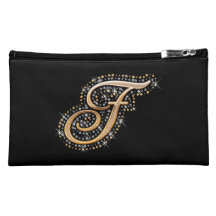 Bolso cosmético negro con F inicial