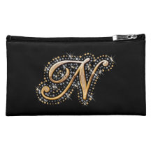 Bolso cosmético negro con N inicial
