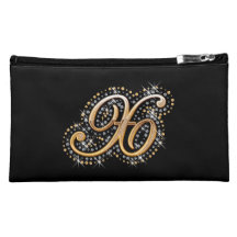 Bolso cosmético negro con X inicial