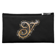 Bolso cosmético negro con Y inicial