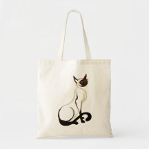 Bolsos siameses del gatito que se sientan bolsas