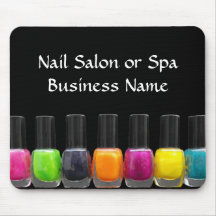 Botellas coloridas del esmalte de uñas, salón del  alfombrillas de ratones