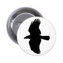 Botón blanco y negro del cuervo pins