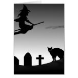 Bruja y gato negro en la noche tarjetas
