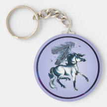 Caballo del tono y llavero azules de la pluma