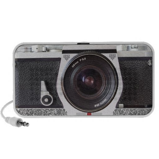 Cámara de SLR con la voluta en el altavoz del meta