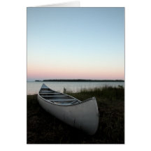 Canoa en la playa tarjetas