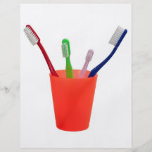 Cepillos de dientes y taza tarjetón