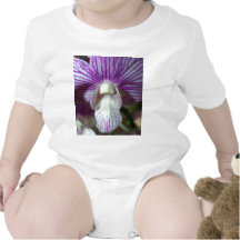 cerrado para arriba de la flor de la orquídea trajes de bebé