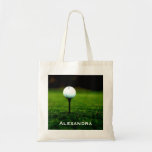 Césped de la hierba verde y pelota de golf/camiset bolsa de mano