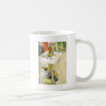 Chica debajo de una tabla de cocina tazas