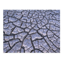 Ciérrese para arriba de fango agrietado en un pais postales