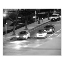 Coches en una luz de la parada arte fotografico