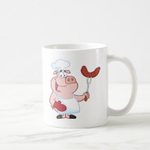 Cocinero feliz del cerdo con la bifurcación de la  taza de café