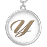 Collares decorativos del monograma del oro
