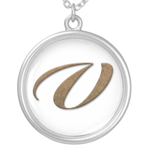 Collares decorativos del monograma del oro