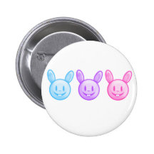 Conejitos de pascua rosados púrpuras azules pins