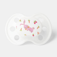 Conejitos rosados con las zanahorias