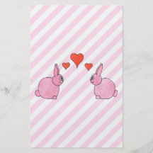 Conejos rosados con los corazones tarjeta publicitaria