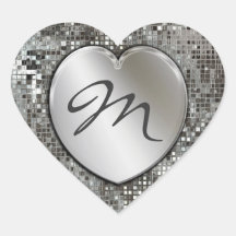 Corazón inicial del monograma en el pegatina de la