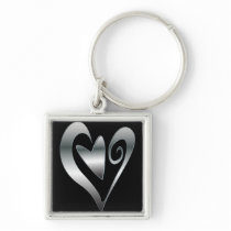 Corazones de plata en negro llaveros