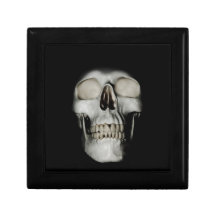 Cráneo sonriente que emerge cajas de regalo