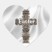 Cruz de Pascua en el pegatina blanco del satén
