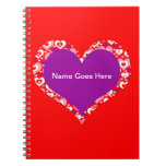 Cuaderno rojo y blanco de los corazones
