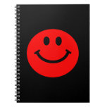 cuaderno sonriente rojo de la cara cuadernos