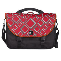 Cuadrados de plata retros en bolso rojo del ordena