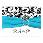 Damasco blanco y negro con la postal azul de RSVP