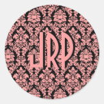 Damasco con monograma del rosa y del negro etiqueta