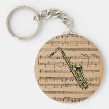 ~ del saxofón con el fondo de la partitura llaveros