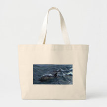 Delfínes en el boatside bolsas