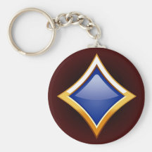 DIAMANTE AZUL ENMARCADO ORO LLAVEROS