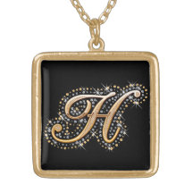 Diamantes y collar de oro de la inicial "H"
