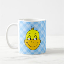 Dibujo animado del pato en modelo azul taza